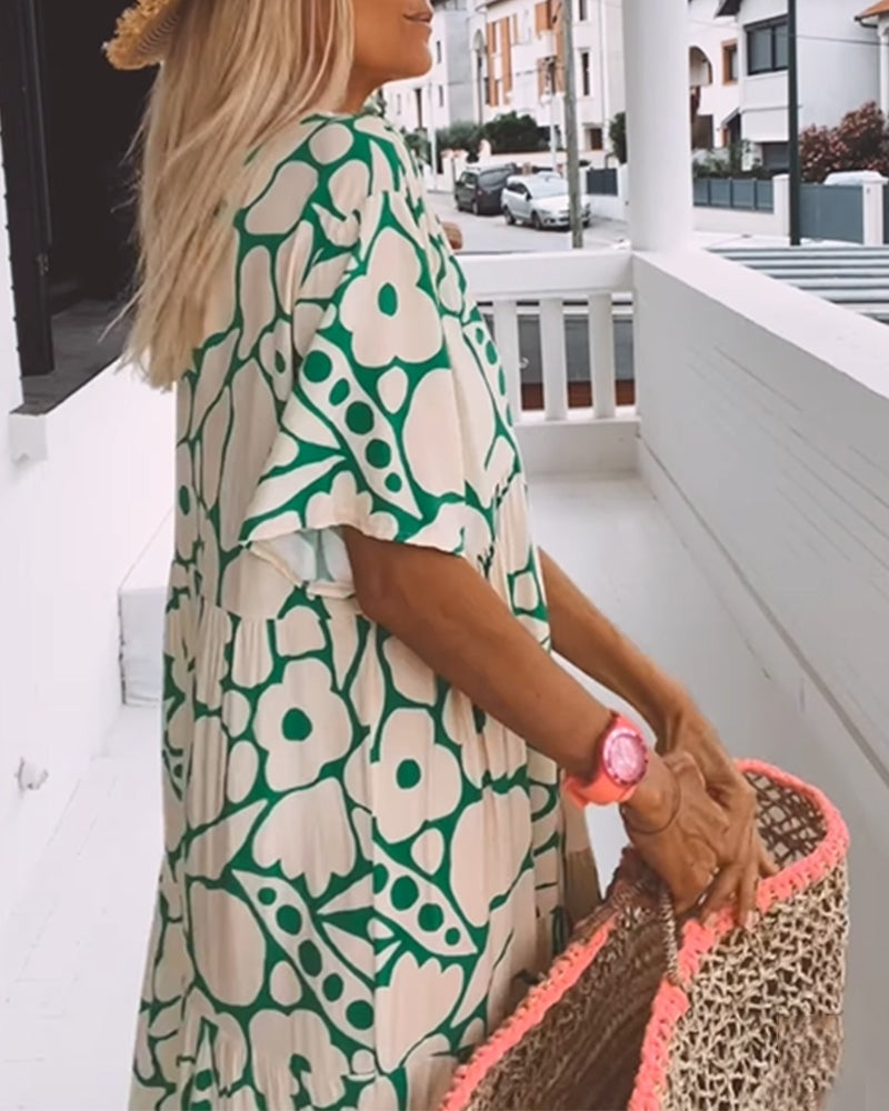 Puck - Loose dress with V-neck and print